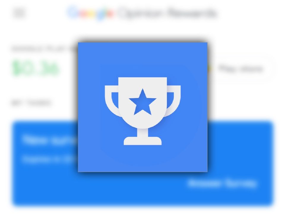 Ikona trofeum z gwiazdą na niebieskim tle, rozmyte elementy interfejsu użytkownika w tle. Ikona aplikacji Premia za ankiety Google