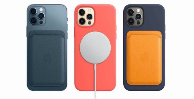 Trzy smartfony z tylnymi aparatami i różnymi akcesoriami: lewy z niebieską osłoną i kieszenią na karty, środkowy z czerwoną osłoną i białym przypinanym ładowarką, prawy z granatową osłoną i żółtą kieszenią na karty.