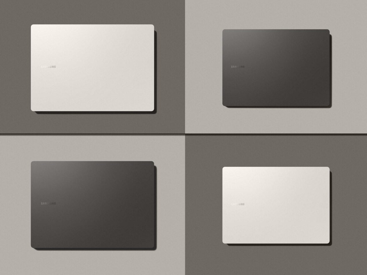 Cztery laptopy marki Samsung, z których dwa są białe, a dwa czarne, na jednolitym tle szarości.