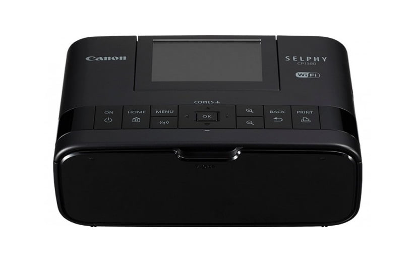 czarna drukarka do zdjęć canon selphy cp1300