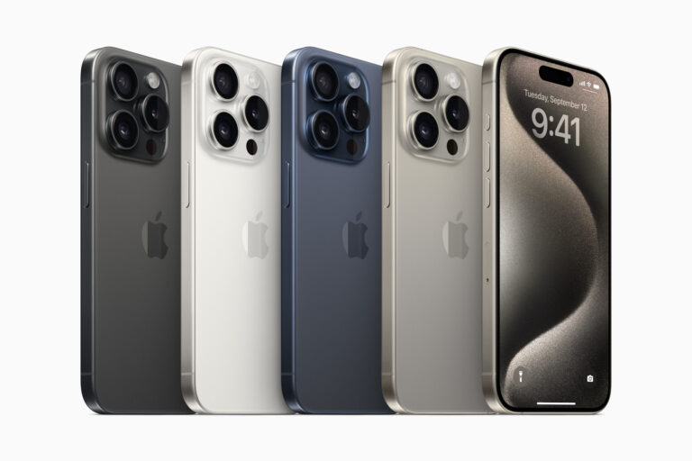 Pięć smartfonów ułożonych tyłem i jeden przodem, pokazujący ich różne kolory i design kamer oraz ekran z wyświetlaną godziną 9:41.