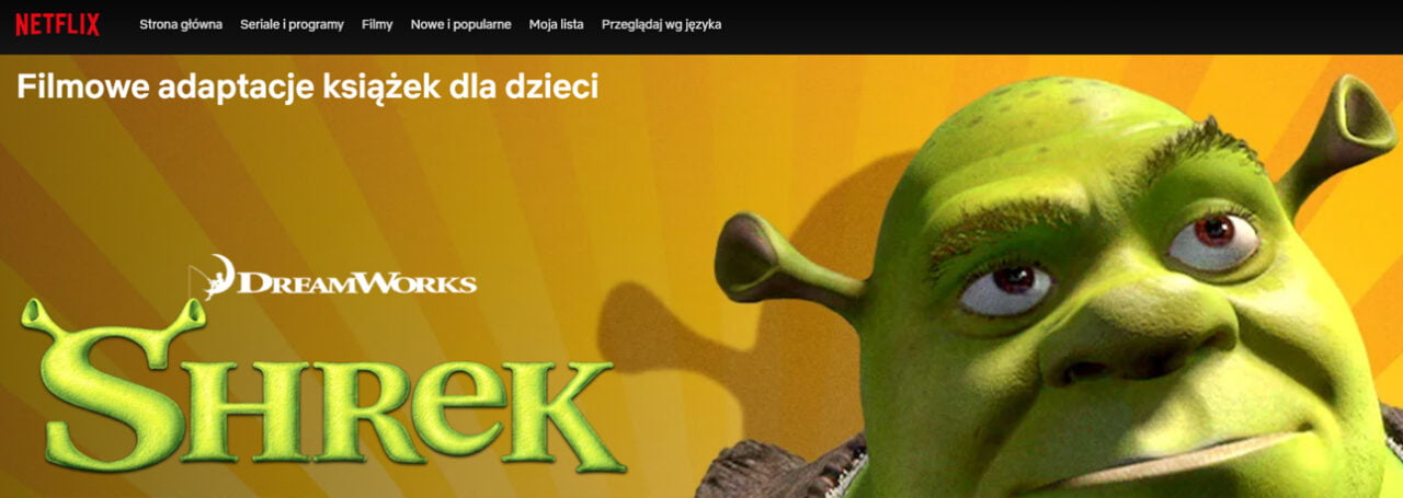 Baner promocyjny filmu "Shrek" na platformie Netflix z logo DreamWorks, zielonym tytułem i zbliżeniem twarzy Shreka na pomarańczowo-żółtym tle z napisem "Filmowe adaptacje książek dla dzieci". Zdjęcie do artykułu pt. Kody Netflix