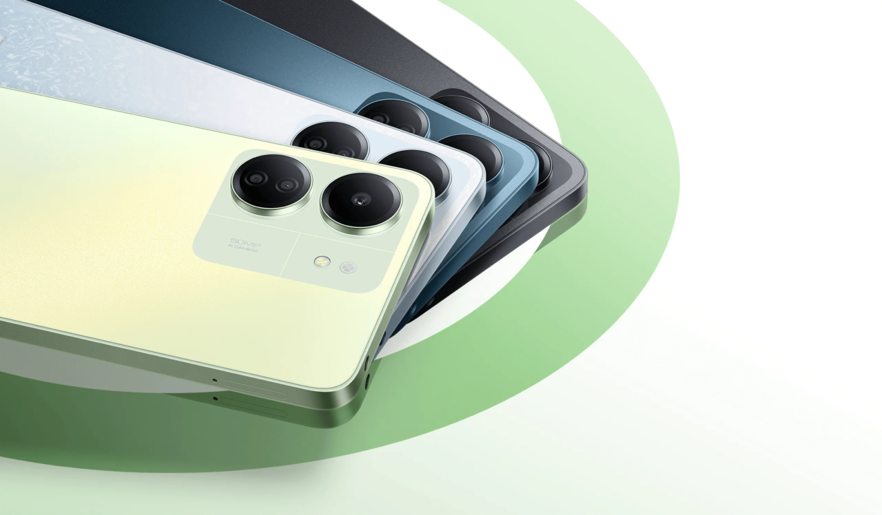 Kilka smartfonów Xiaomi w kolorach: jasnozielonym, białym, niebieskim i czarnym, leżących obok siebie.