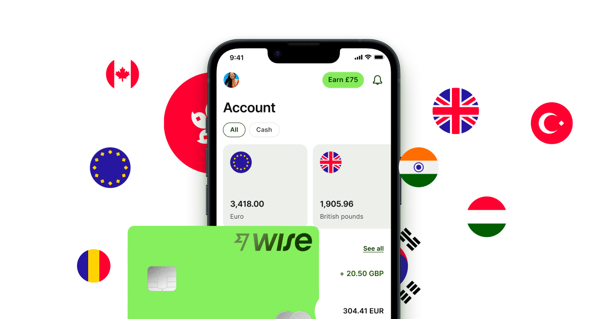 Fragment smartfona z aplikacją finansową Wise na ekranie. W tle flagi różnych państw.