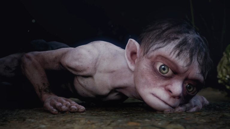 Obraz przedstawia postać Golluma, znaną z serii filmów "Władca Pierścieni", pełzającą po ciemnym terenie.