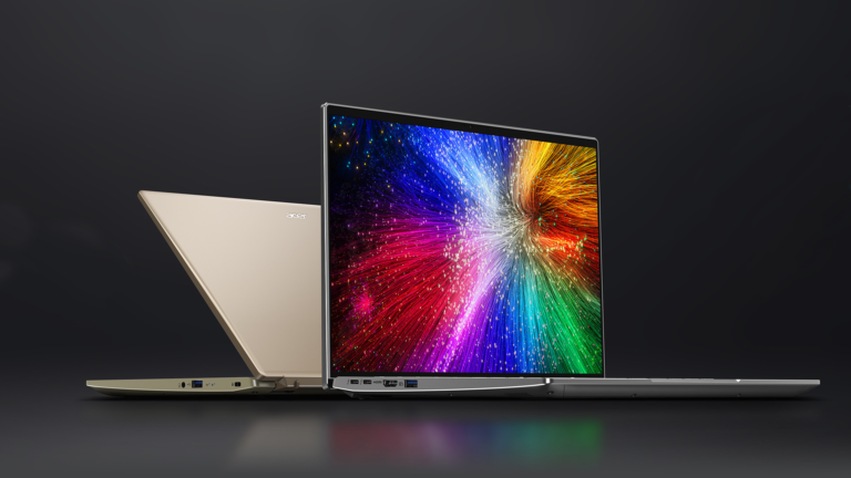 Dwa laptopy Acer otwarte na szarym tle, z ekranami wyświetlającymi kolorową grafikę przypominającą eksplozję światła.