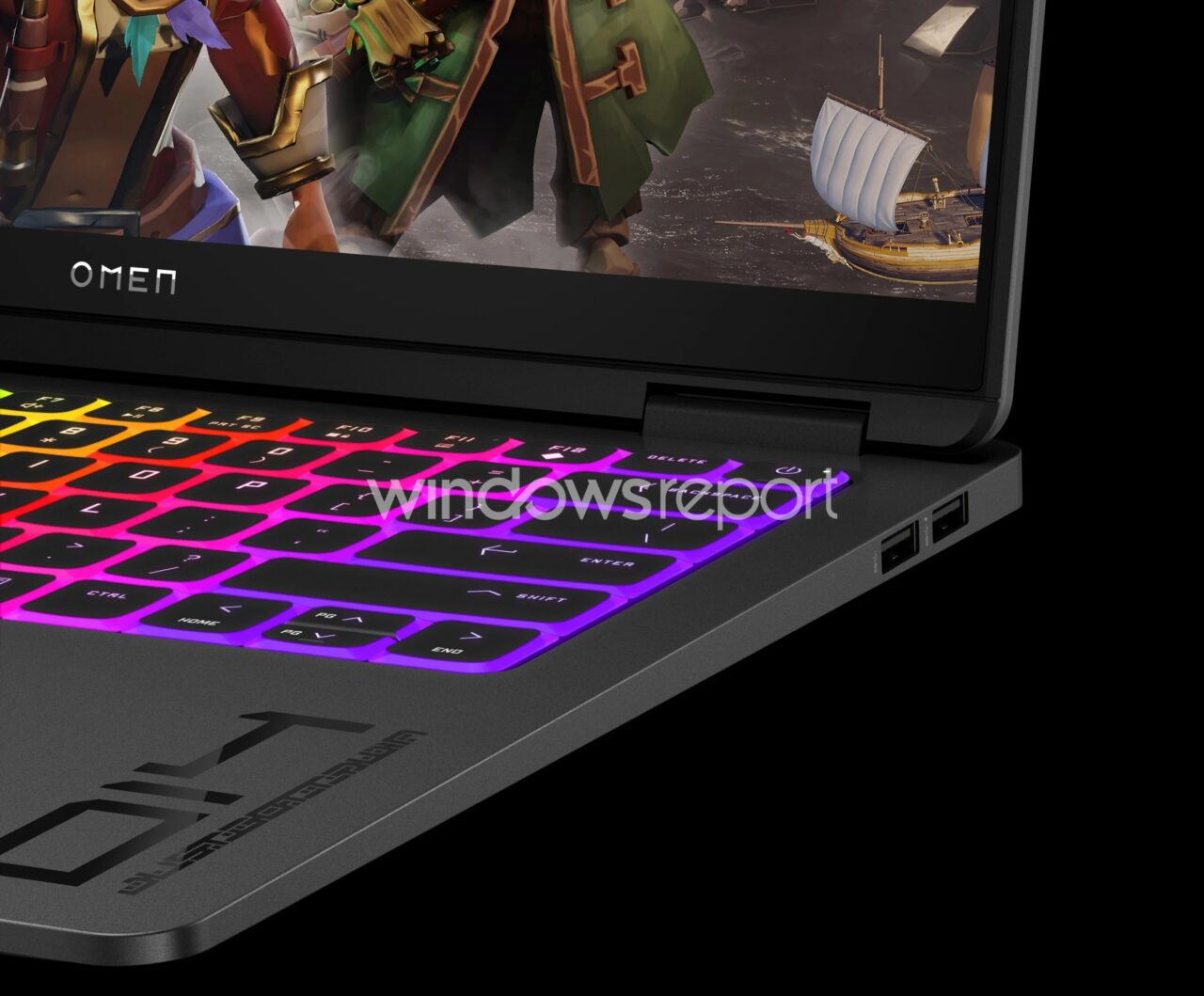 Częściowy widok klawiatury laptopa gamingowego z podświetleniem RGB i wyświetlaczem, na którym znajduje się grafika z gry oraz logo OMEN.