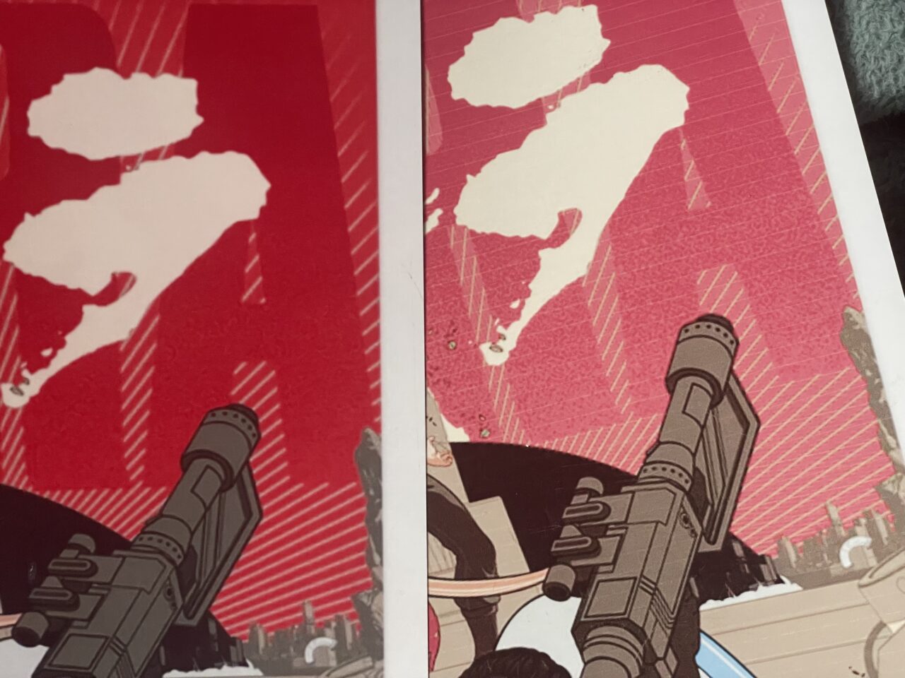 Grafika komiksowa przedstawiająca osobę trzymającą futurystyczną broń skierowaną w górę na tle czerwonego nieba z białymi plamami.
