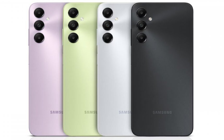 Vier Samsung-Smartphones horizontal nebeneinander angeordnet, mit Rückkameras in der oberen linken Ecke, in Farben von Pink über Grün und Silber bis Schwarz.