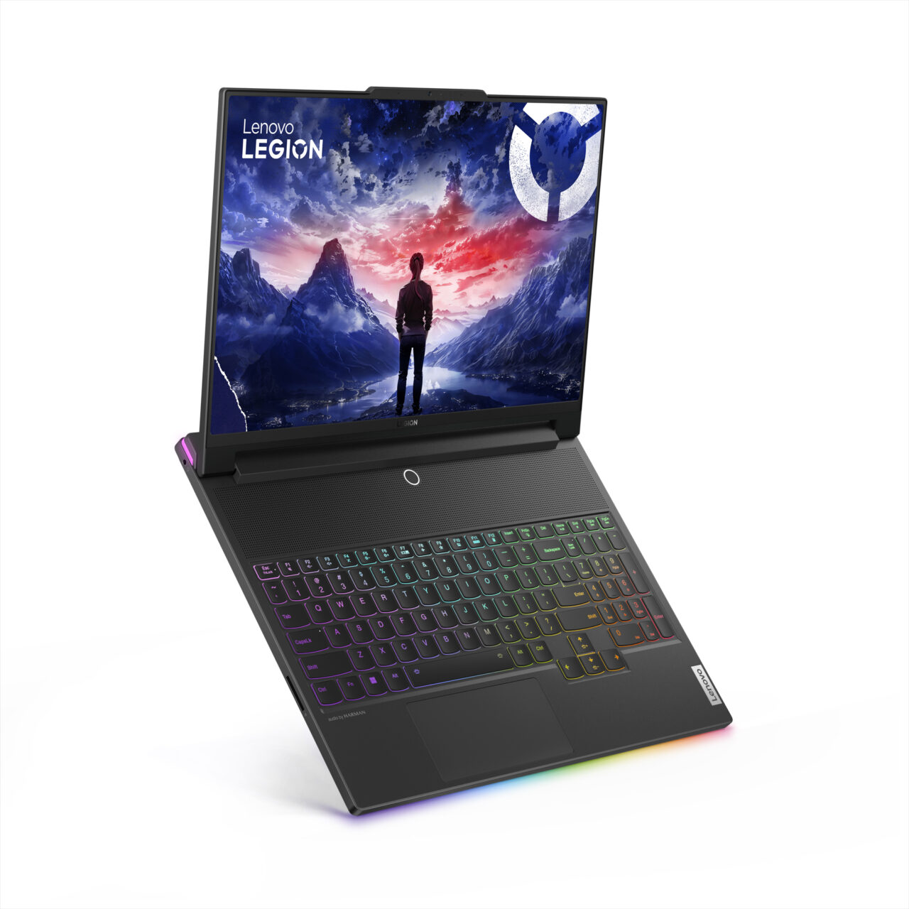 Laptop gamingowy Lenovo Legion otwarty z klawiaturą podświetlaną RGB na pierwszym planie oraz tapetą z postacią ludzką stojącą na tle górskiego krajobrazu i kosmicznego nieba na ekranie.