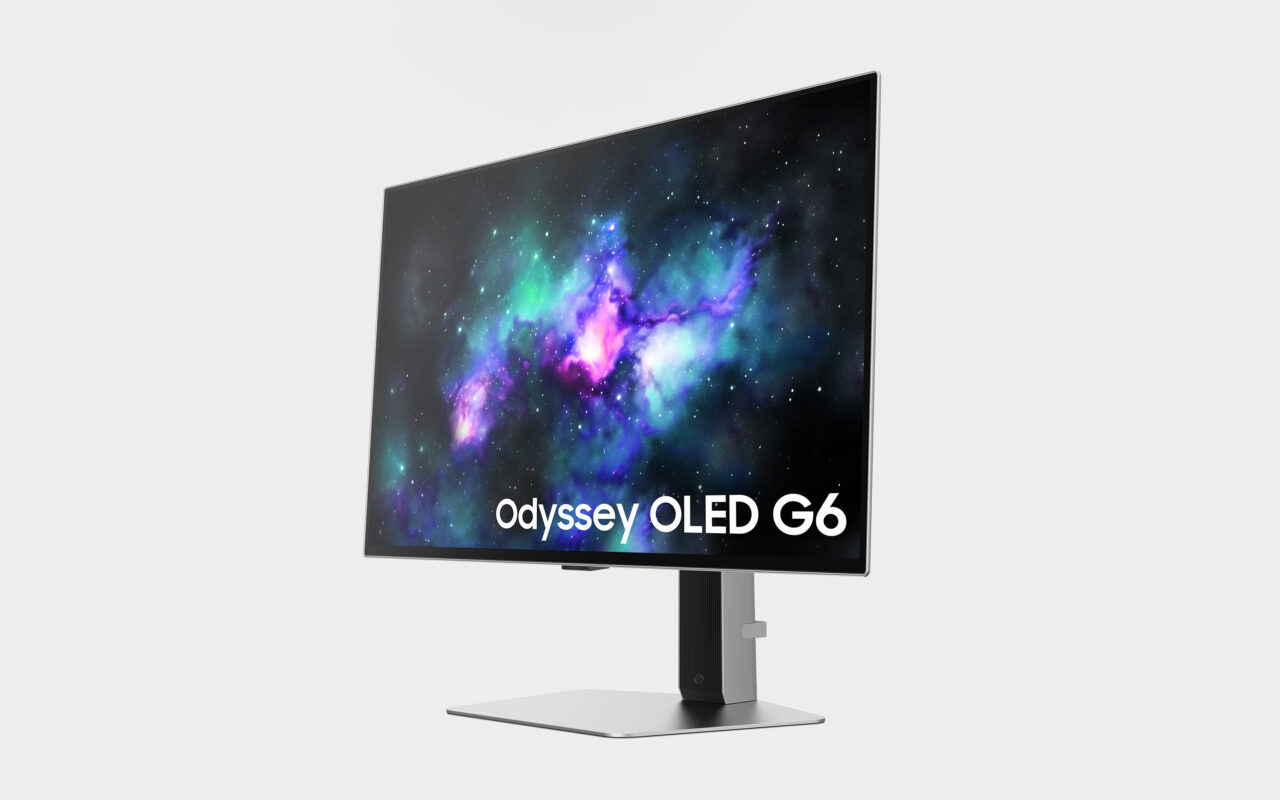 Monitor komputerowy z wizerunkiem kosmosu na ekranie i napisem "Odyssey OLED G6".
