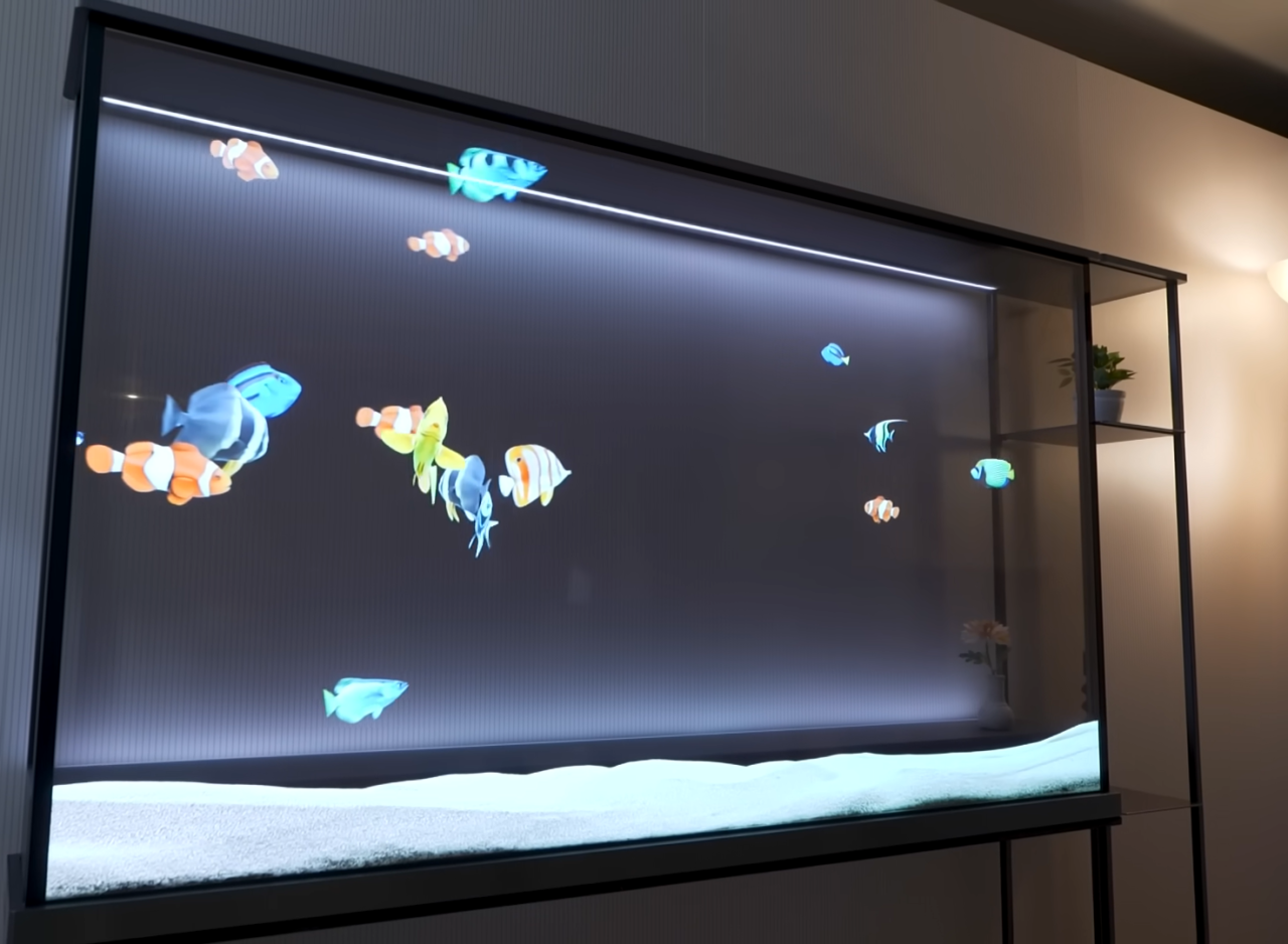 Telewizor LG jako Akwarium z kolorowymi rybami tropikalnymi w nowoczesnym wnętrzu.