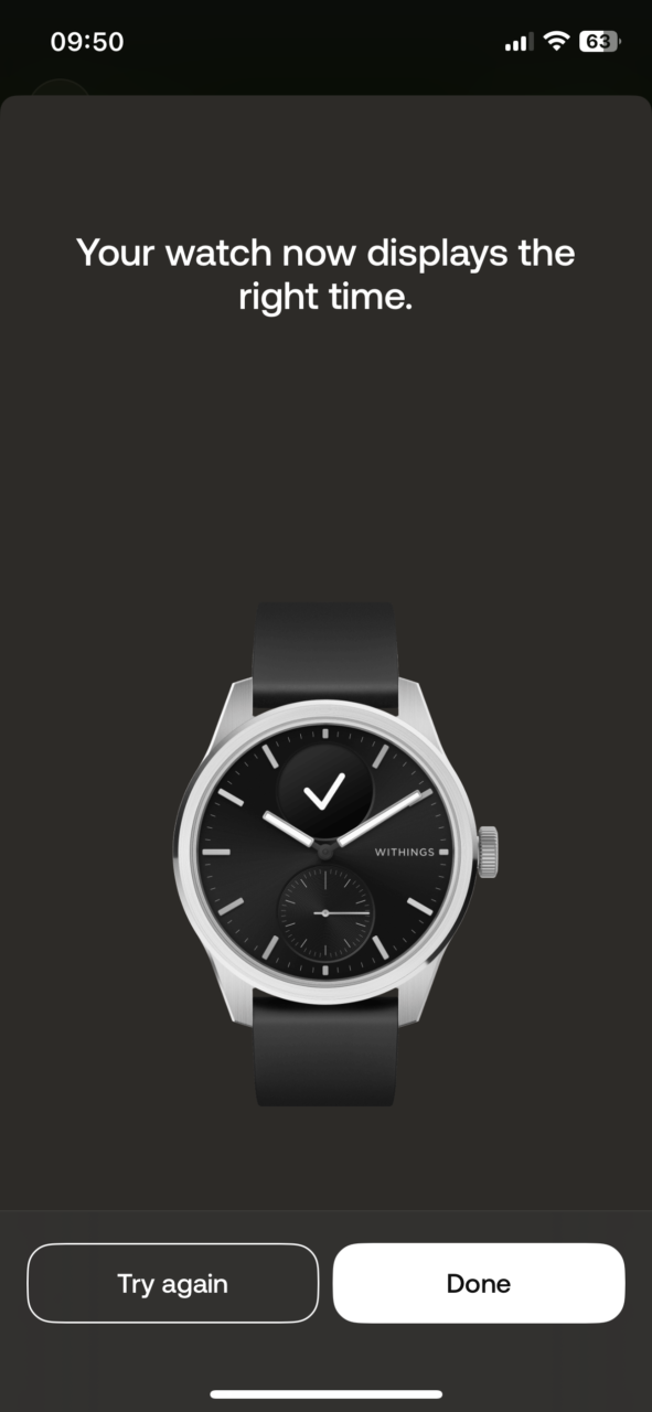 Zegarek na ekranie smartfona z tekstem "Your watch now displays the right time", przyciskami "Try again" i "Done".