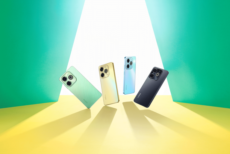 Cztery smartfony w różnych kolorach ustawione pionowo z tyłu, na tle w kształcie litery V w kolorach zielonym i żółtym.