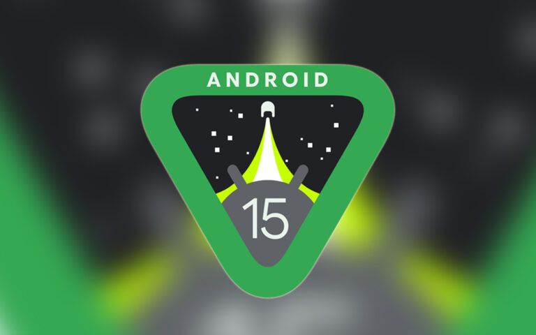 Grafika z trójkątnym logo Android 15 z numerem 15 i drogą prowadzącą do horyzontu, umieszczonym na rozmytym zielonym tle.