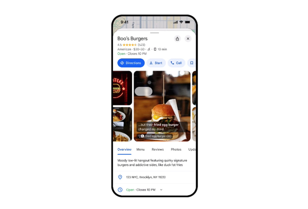 Smartfon wyświetlający informacje o restauracji "Boo’s Burgers" na aplikacji z opiniami restauracji, w tle widoczny burger z jajkiem sadzonym.