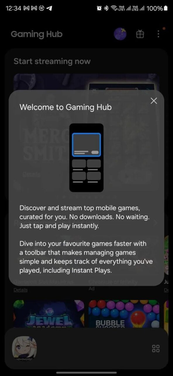 Zrzut ekranu z komunikatem powitalnym aplikacji Gaming Hub na smartfonie, pokazujący ikonę konsoli do gier i tekst zachęcający do odkrywania i strumieniowania gier mobilnych bez konieczności pobierania, z reklamami gier na dole ekranu.