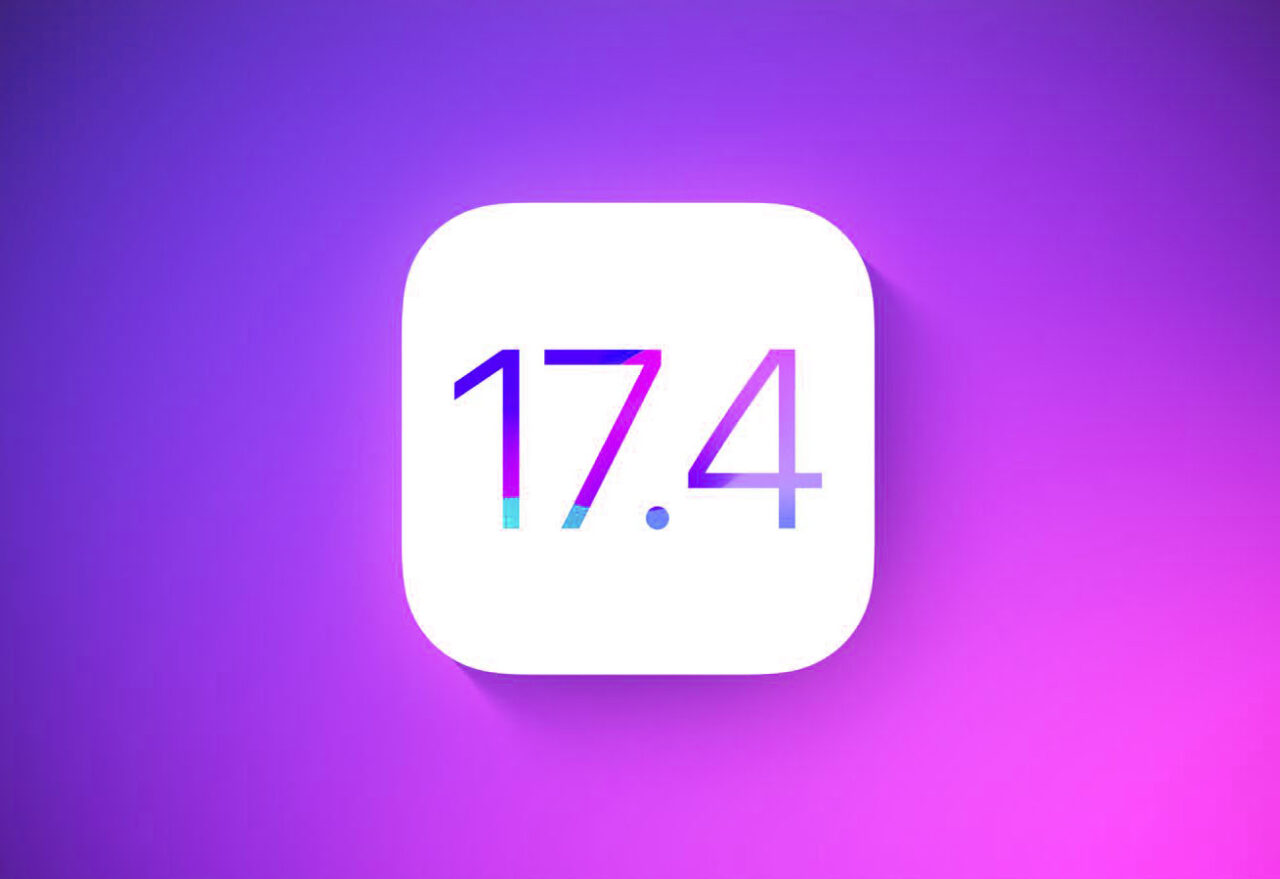 Atak na iPhone'y. Ikona z zaokrąglonymi rogami na gradientowym tle w kolorach fioletu i różu z białymi cyframi "17.4" w stylu modernistycznym.