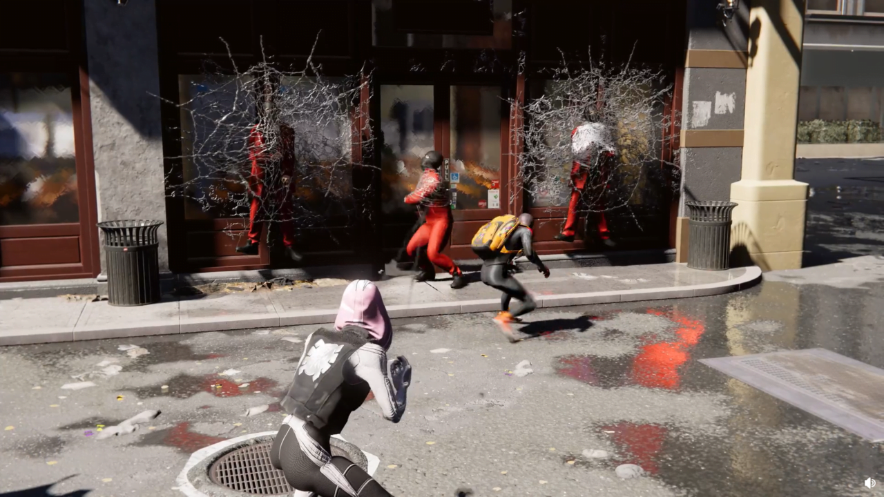 Obraz przedstawia scenę z gry wideo Spider-Man The Great Web, gdzie postać w purpurowym kapturze i czarnym stroju biegnie ulicą, a z tyłu widać innych ludzi przywiązanych do drzwi przy użyciu jakiegoś białego materiału przypominającego pajęczynę.