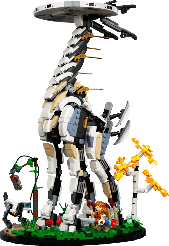 Zestawy LEGO dla graczy, czyli Żyraf z gry Horizon Forbidden West przedstawiający fantastycznego robota w kształcie dinozaura, stojącego wśród scenerii z klockowymi roślinami i małymi figurkami.