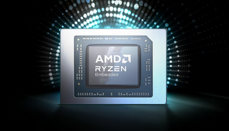 Procesor AMD Ryzen Embedded z widocznymi pinami na tle cyfrowej matrycy emitującej niebieskie światło.