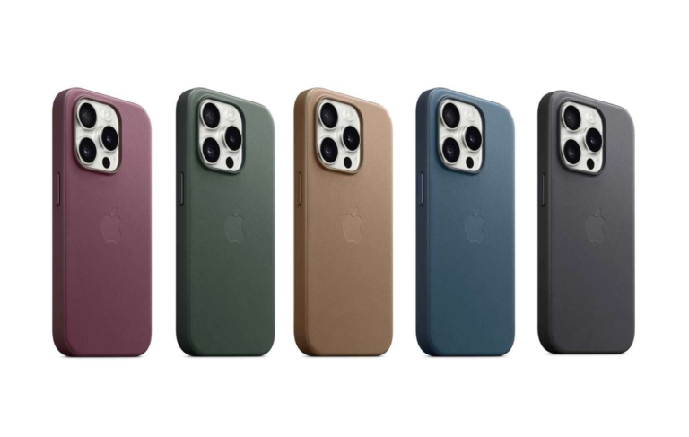 Rząd pięciu smartfonów w różnych kolorach od lewej: różowy, zielony, złoty, niebieski, grafitowy, każdy z potrójnym aparatem.