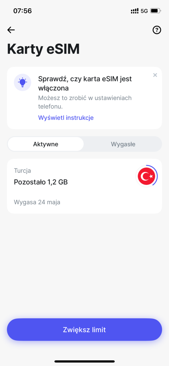 Ekran telefonu z informacją o kartach eSIM, pozostałym limicie danych 1,2 GB w Turcji oraz przyciskiem "Zwiększ limit".