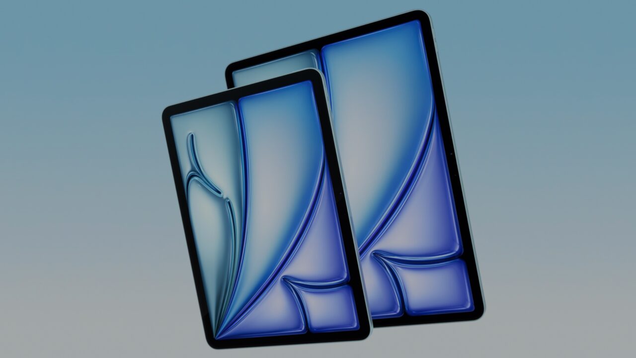 Dwa nowoczesne tablety odbijające wzór zaprojektowany z dynamicznie płynącymi niebieskimi liniami na gradientowym tle.