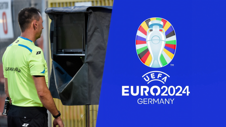 Sędzia piłkarski przed monitorem systemu VAR, logo UEFA Euro 2024 w Niemczech.