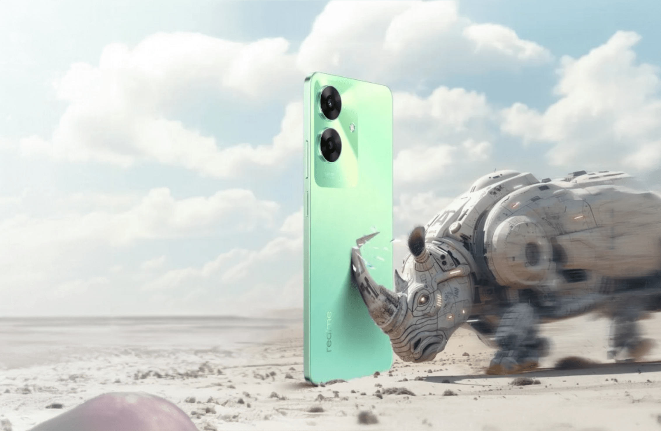 Zielony telefon realme na pustyni, atakowany przez futurystycznego, mechanicznego nosorożca.