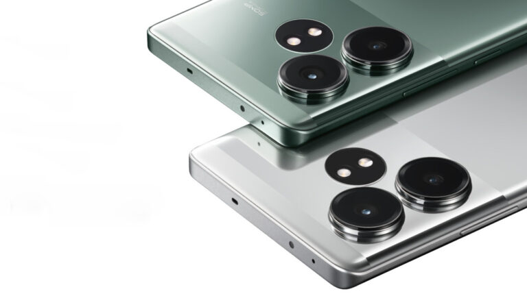 Dwa smartfony z trzema aparatami każdy, jeden w kolorze zielonym, drugi w kolorze srebrnym, leżące w pozycji ukośnej.