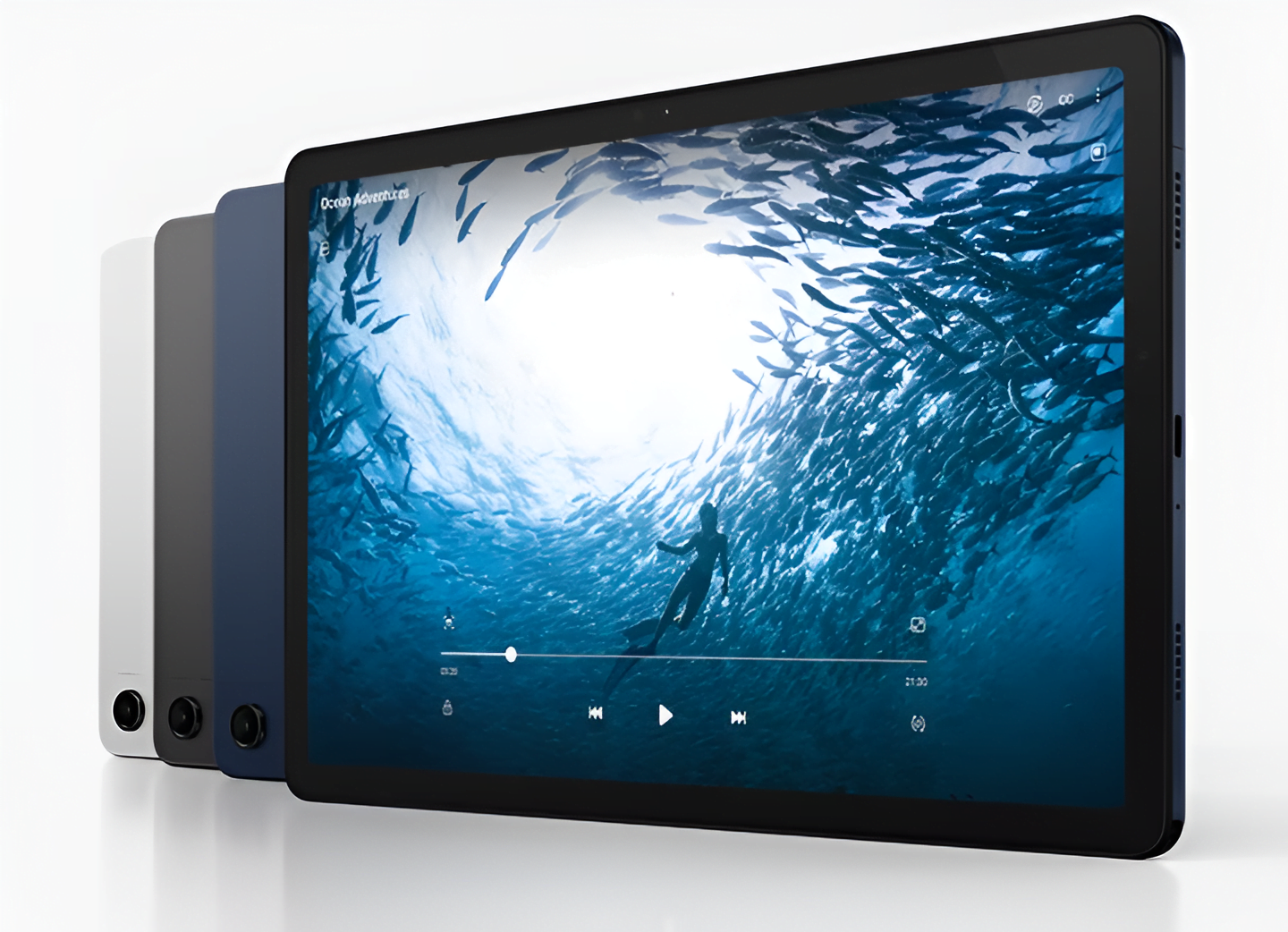 Tablet Samsung Galaxy Tab A9 z wyświetlonym filmem z nurkiem otoczonym rybami, w tle trzy inne tablety w różnych kolorach.