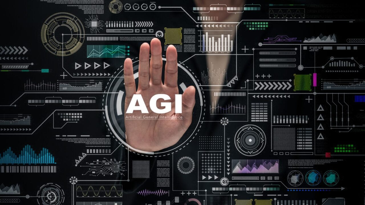 AGI w OpenAI. Grafika przedstawiająca dłoń na tle elementów interfejsu użytkownika z napisem "AGI Artificial General Intelligence".