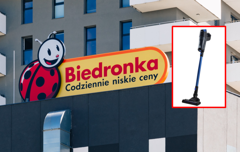 Szyld sklepu Biedronka oraz ilustracja odkurzacza pionowego.