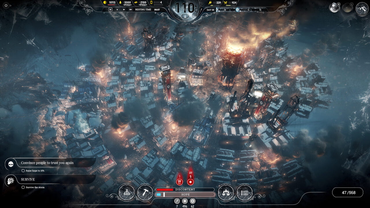 Zrzut ekranu z gry Frostpunk, pokazujący widok miasta z góry, intensywne zimno (-110°C) i interfejs użytkownika z postępami przeżycia oraz stanu nadziei i niezadowolenia.