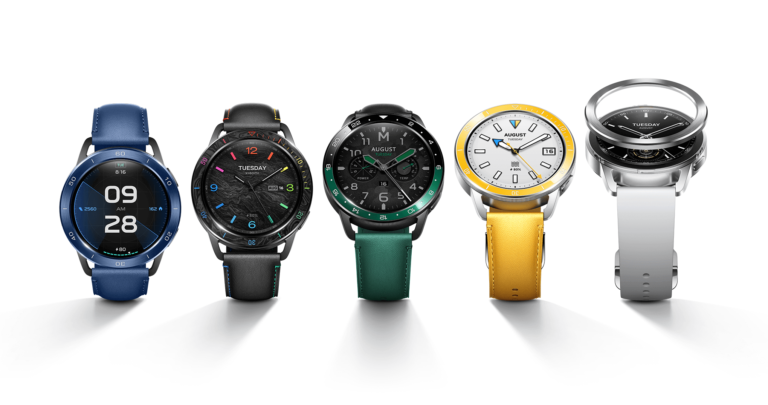Pięć inteligentnych zegarków Xiaomi z różnymi tarczami i kolorowymi paskami ułożonych w rzędzie.