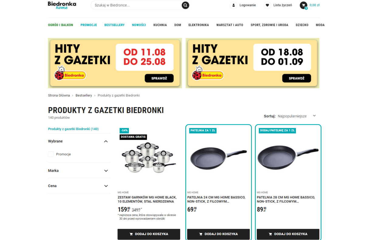 Produkty z gazetki Biedronki na stronie internetowej sklepu, w tym zestaw garnków i patelnie.